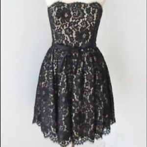Strapless black lace dress